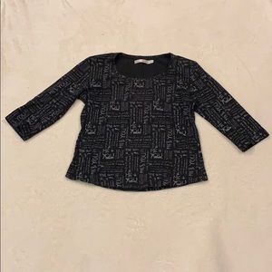 Black and grayish/white shirt